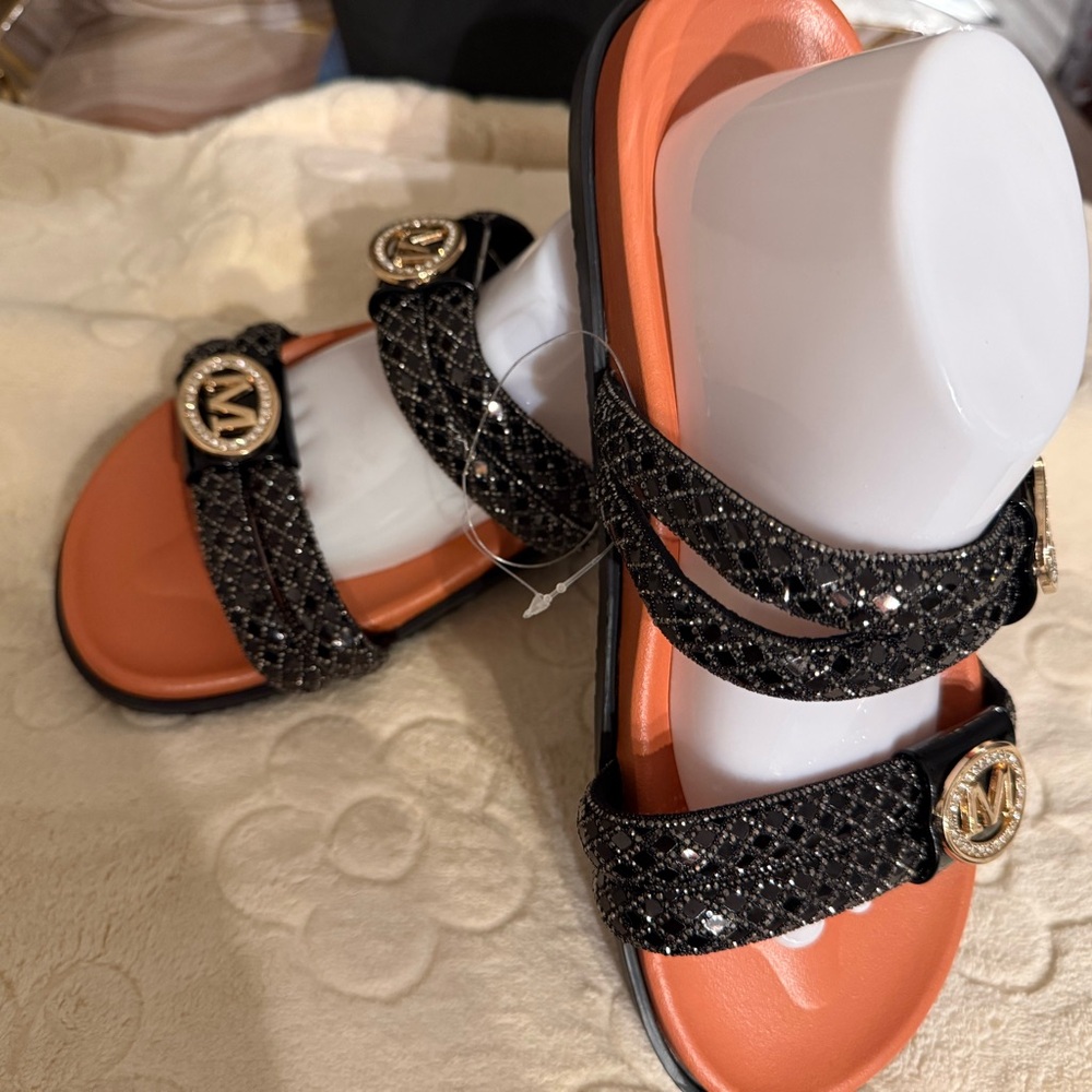 Elegant Black and Orange Sandals with Gold Detail